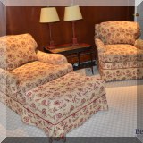 F29. Pair of beige and red swivel chairs with matching ottoman. 34”h x 38”w x 41”d 